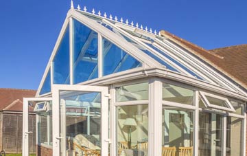 conservatory roof insulation costs Burgh Heath
